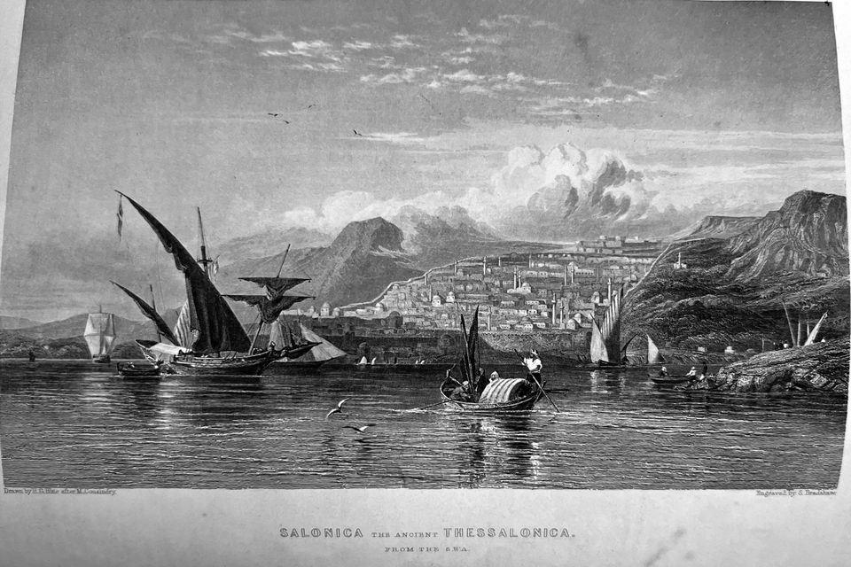 Victorian engraving of Salonica from the sea, with sailing vessels in the foreground and the city on the hillside.